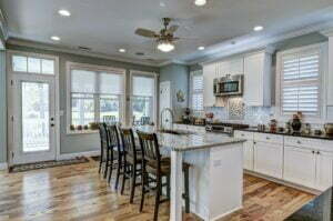 Beautiful kitchen interior with white cabinets.